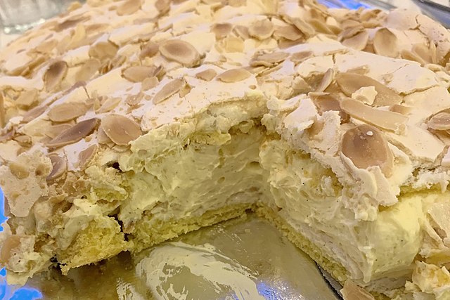 Norwegian Kvaefjordkake: Rich, creamy, almond-infused delight.
