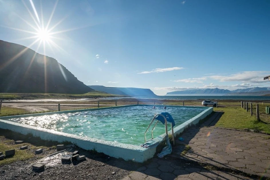 The rustic charm and stunning surroundings of Reykjafjarðarlaug 